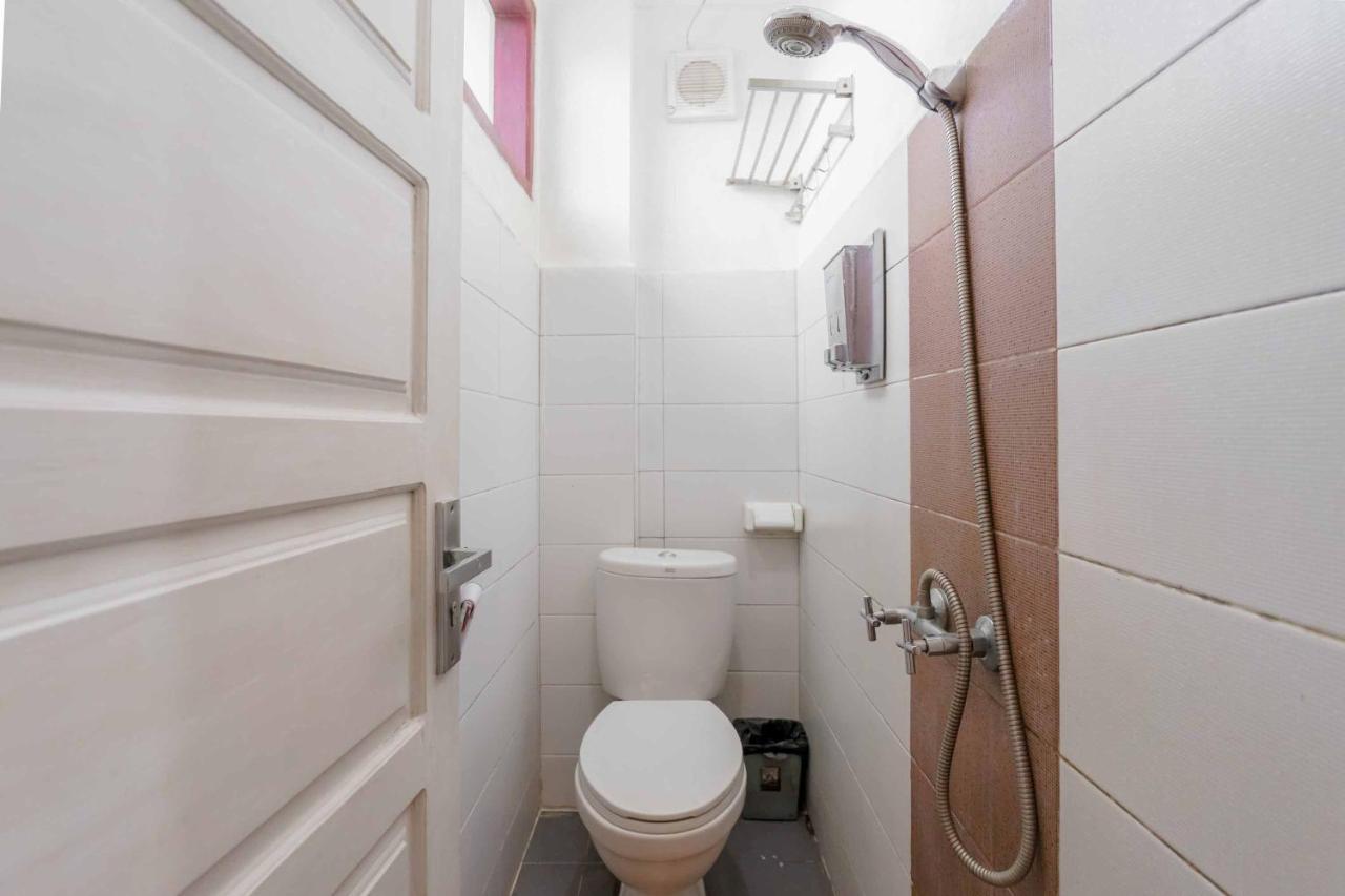 בוקיטינגי Urbanview Hotel Ananda Syariah By Reddoorz מראה חיצוני תמונה