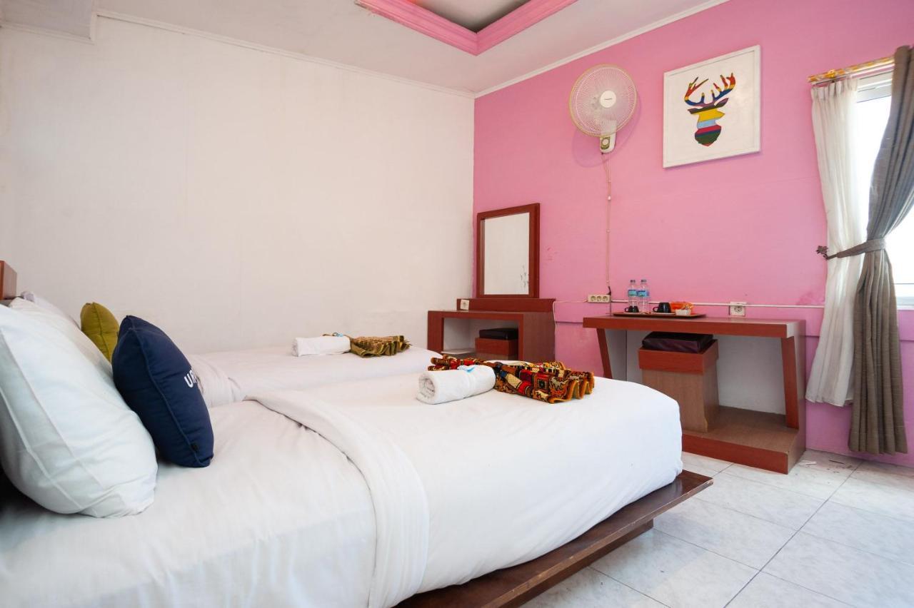 בוקיטינגי Urbanview Hotel Ananda Syariah By Reddoorz מראה חיצוני תמונה