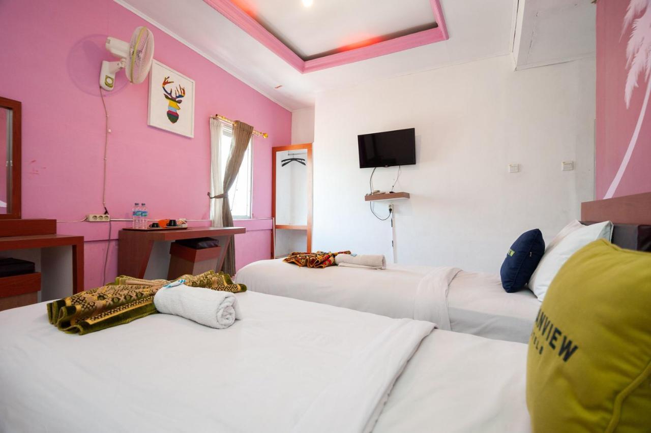 בוקיטינגי Urbanview Hotel Ananda Syariah By Reddoorz מראה חיצוני תמונה